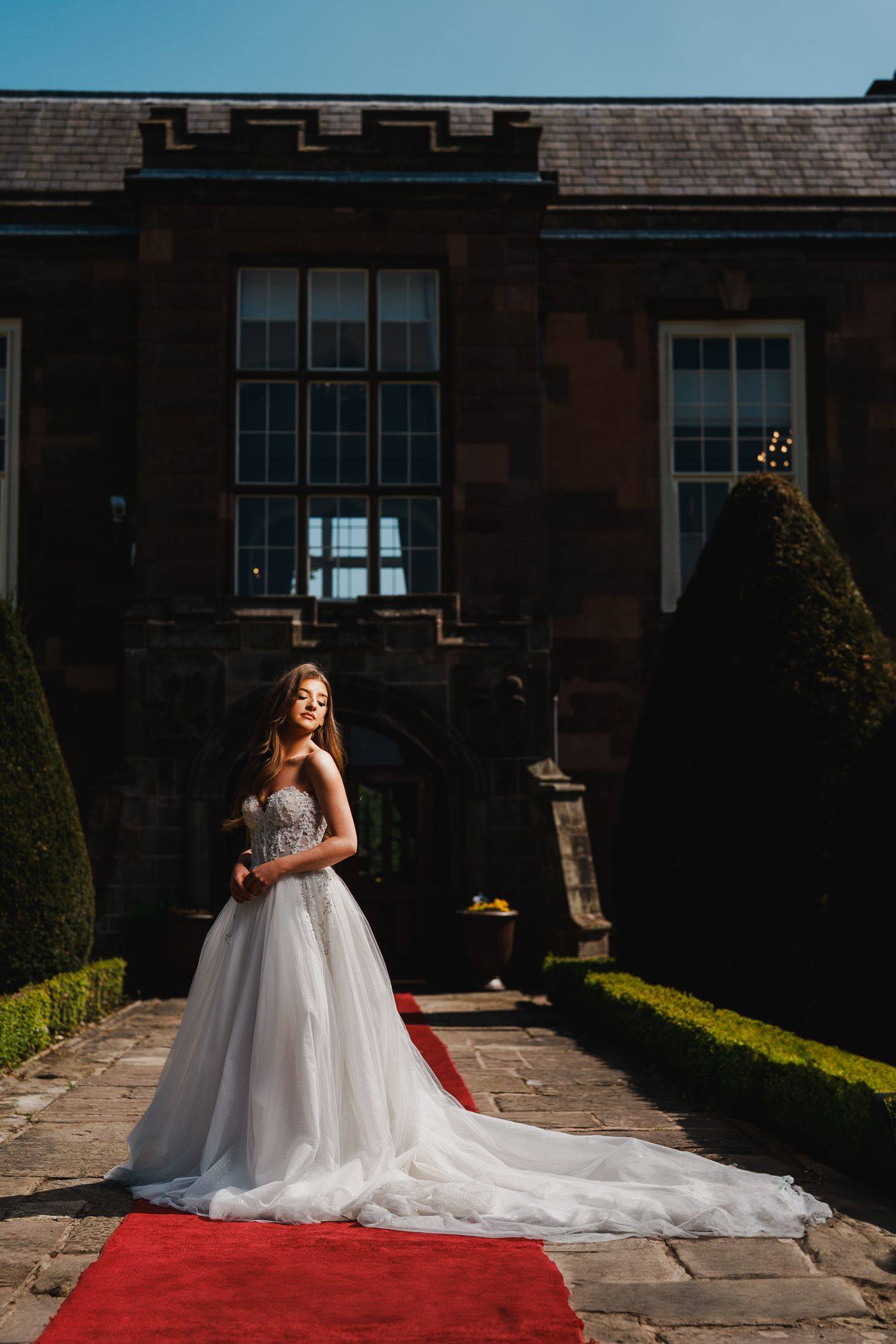 A bride on the red carpet outside the Abbey