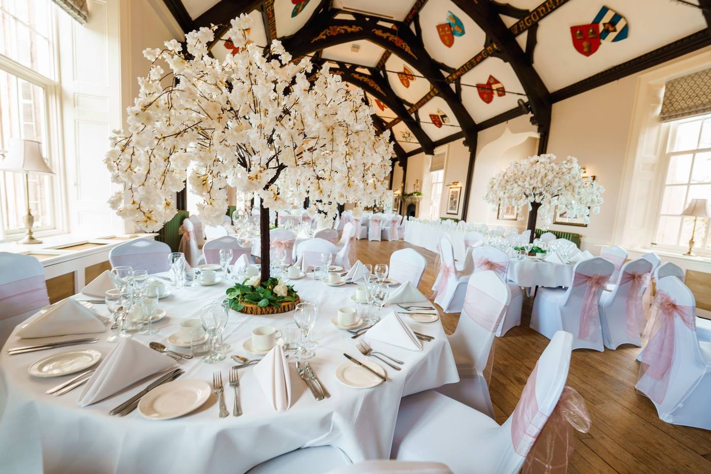 Tables dressed with blossom trees