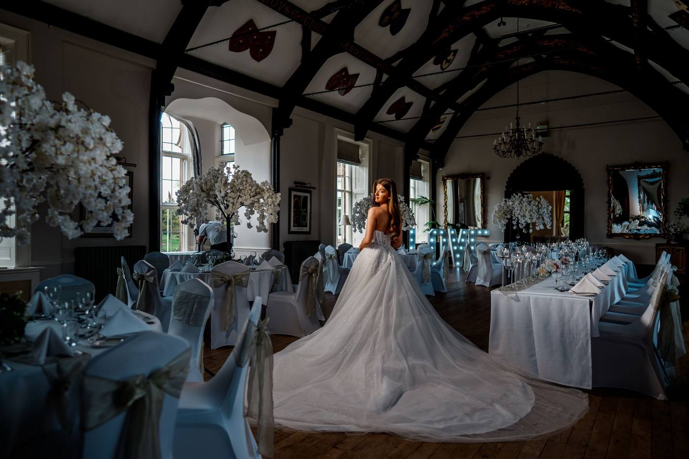 A bride in the Great Hall set for a wedding